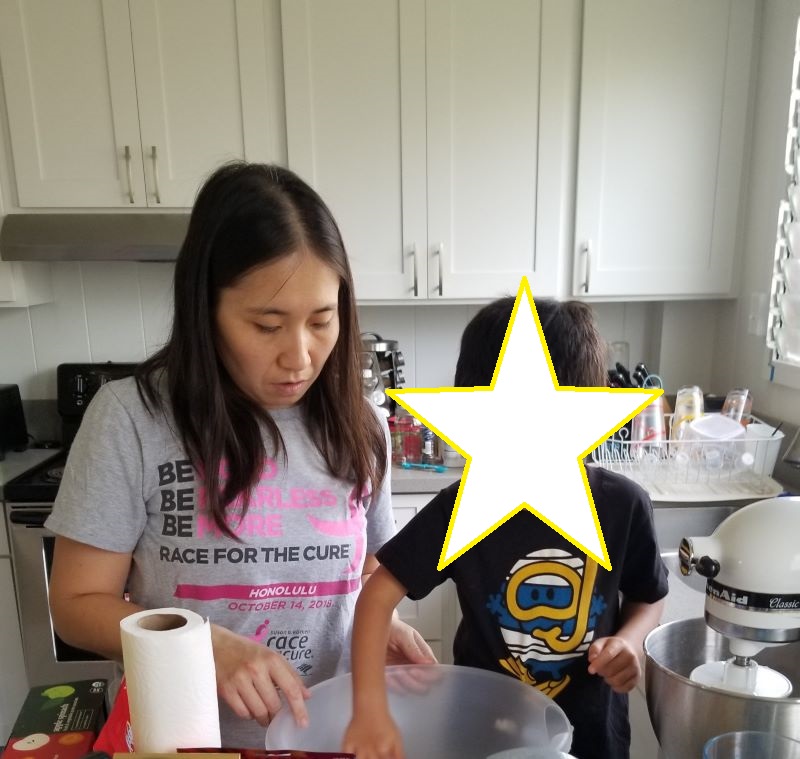 Kat Park cooking with son