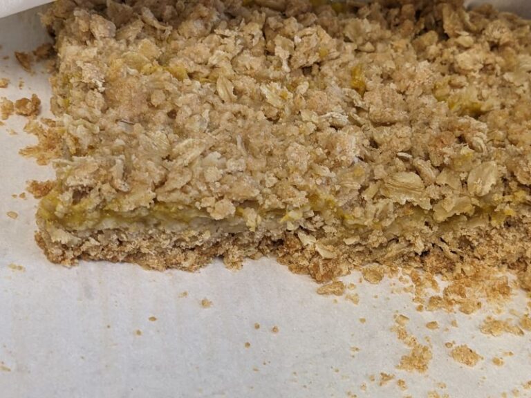 close up view of mango oat bars in pan