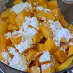 mango chunks, sugar and cornstarch in food processor before blending