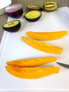 papaya, avocado, and red onion