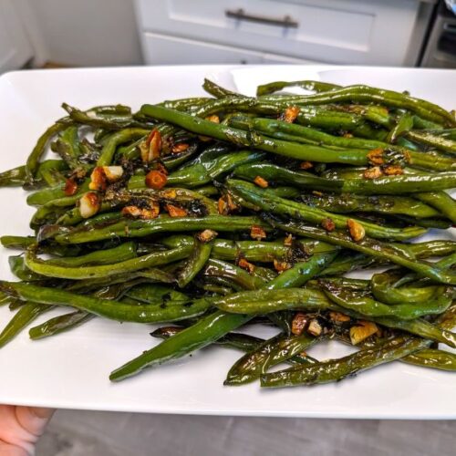 plate of green beans roasted with garlic