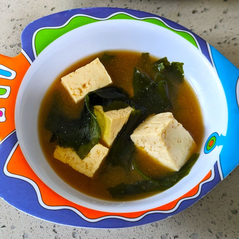 bowl of tofu miso soup with wakame seaweed