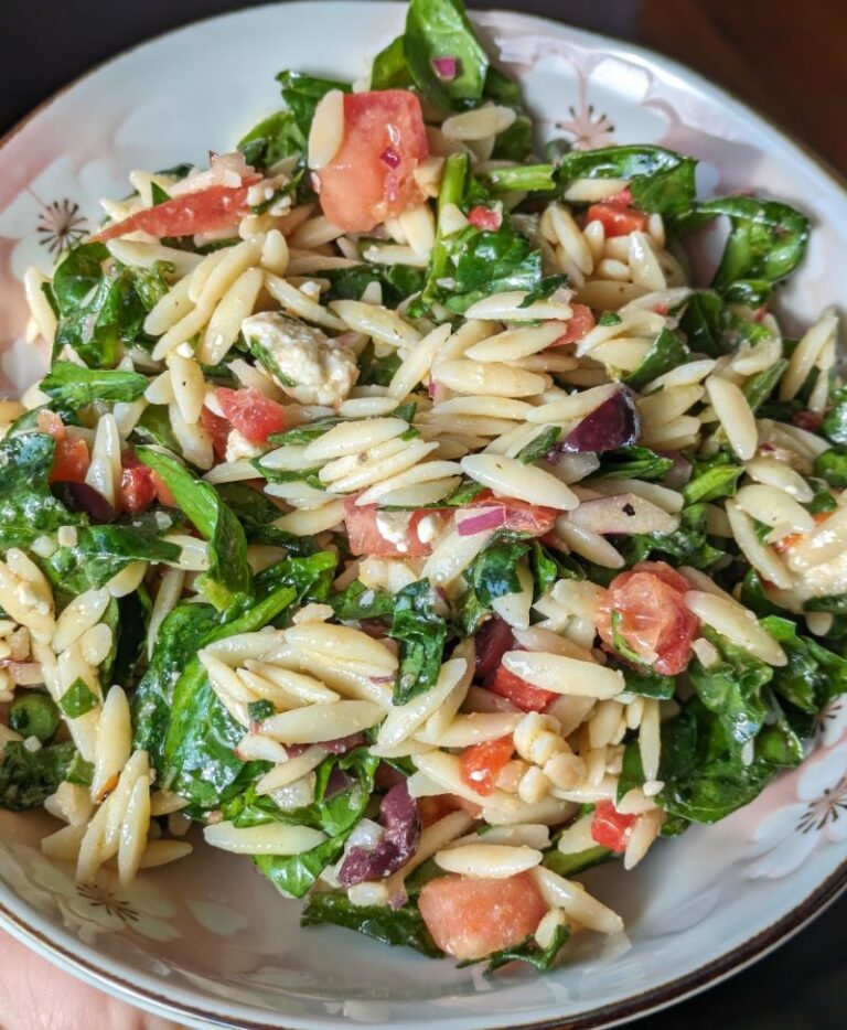 spinach orzo salad without cucumbers in a bowl
