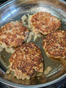 Canned Corned Beef Hash Patties in pan resized