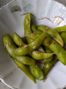 bowl of garlic edamame