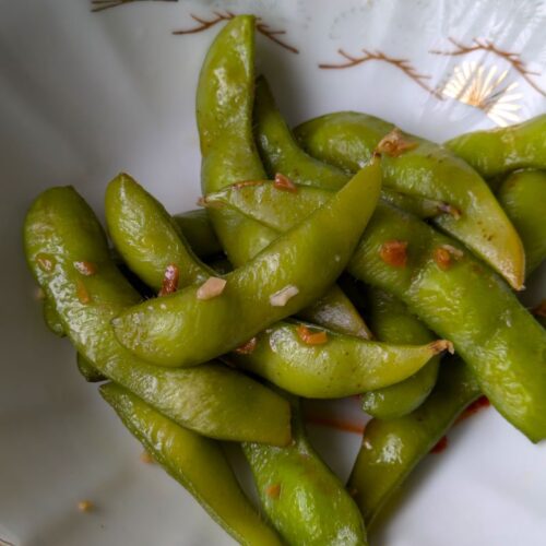 bowl of garlic edamame