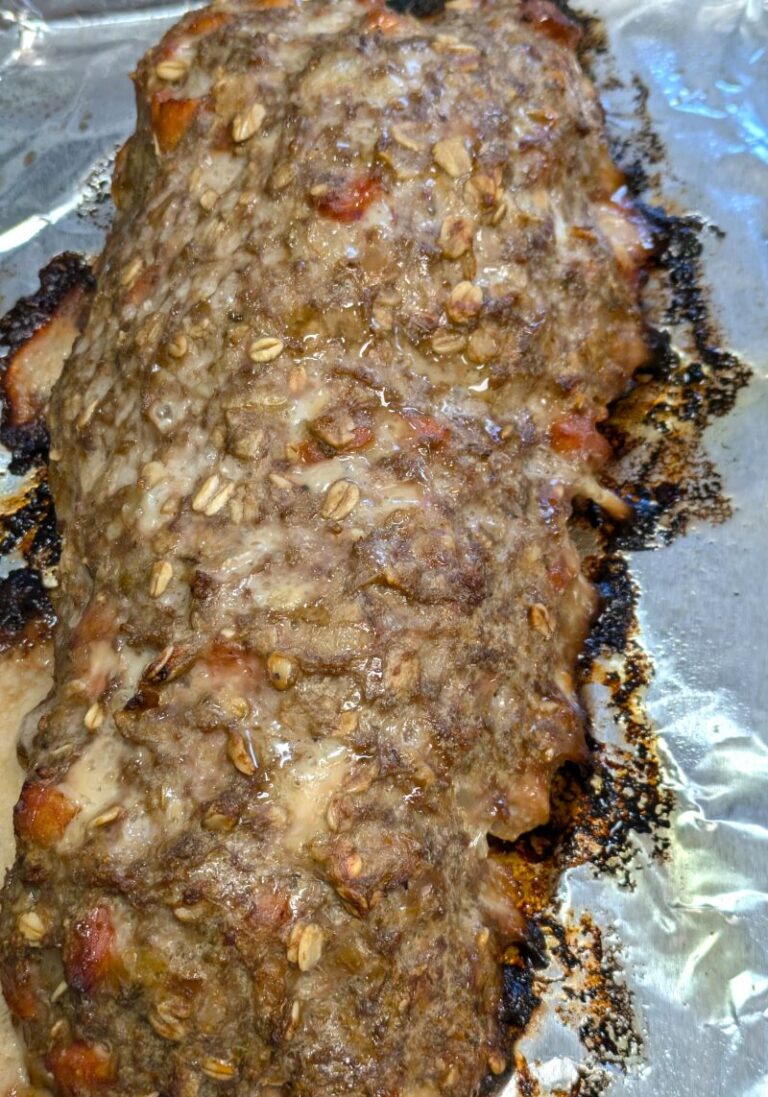 Loaf of portuguese sausage meatloaf on a pan