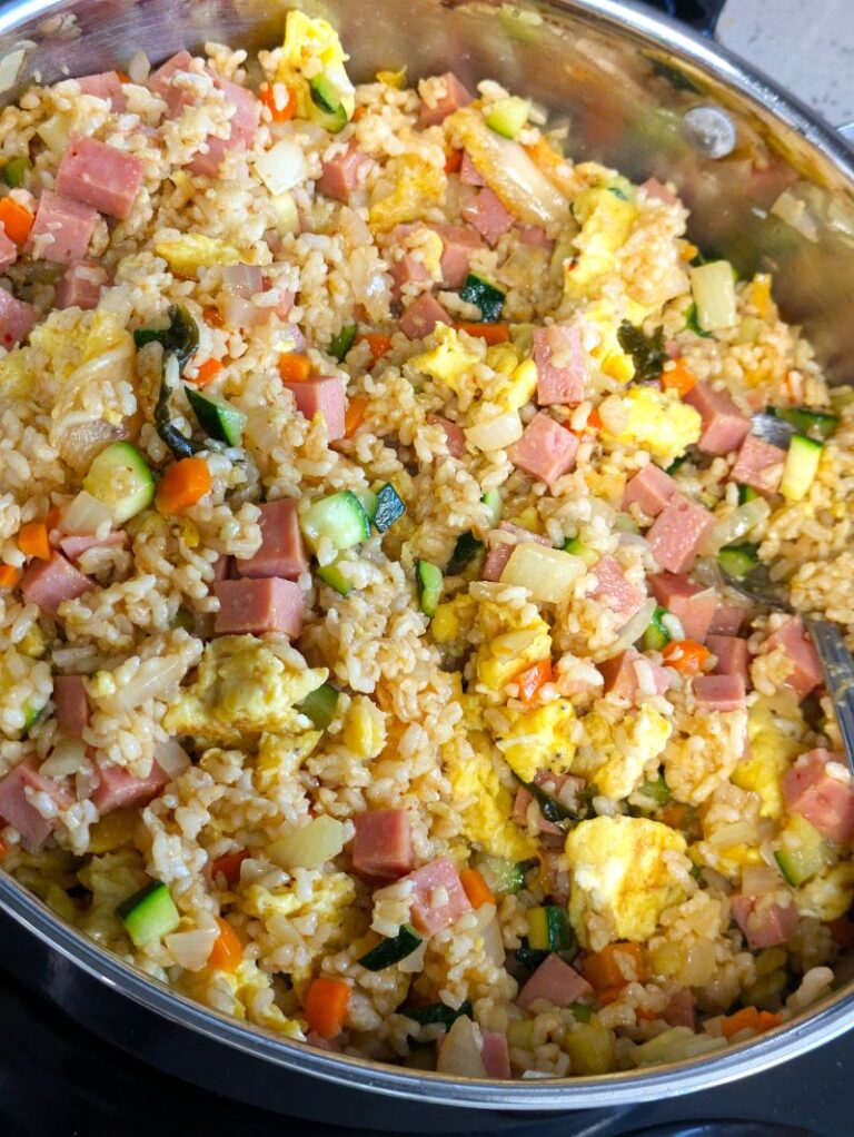 spam and zucchini fried rice in a pan