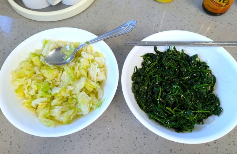 Hawaii-Style Cabbage banchan next to spinach banchan