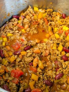 a big batch of mild turkey chili in a pot