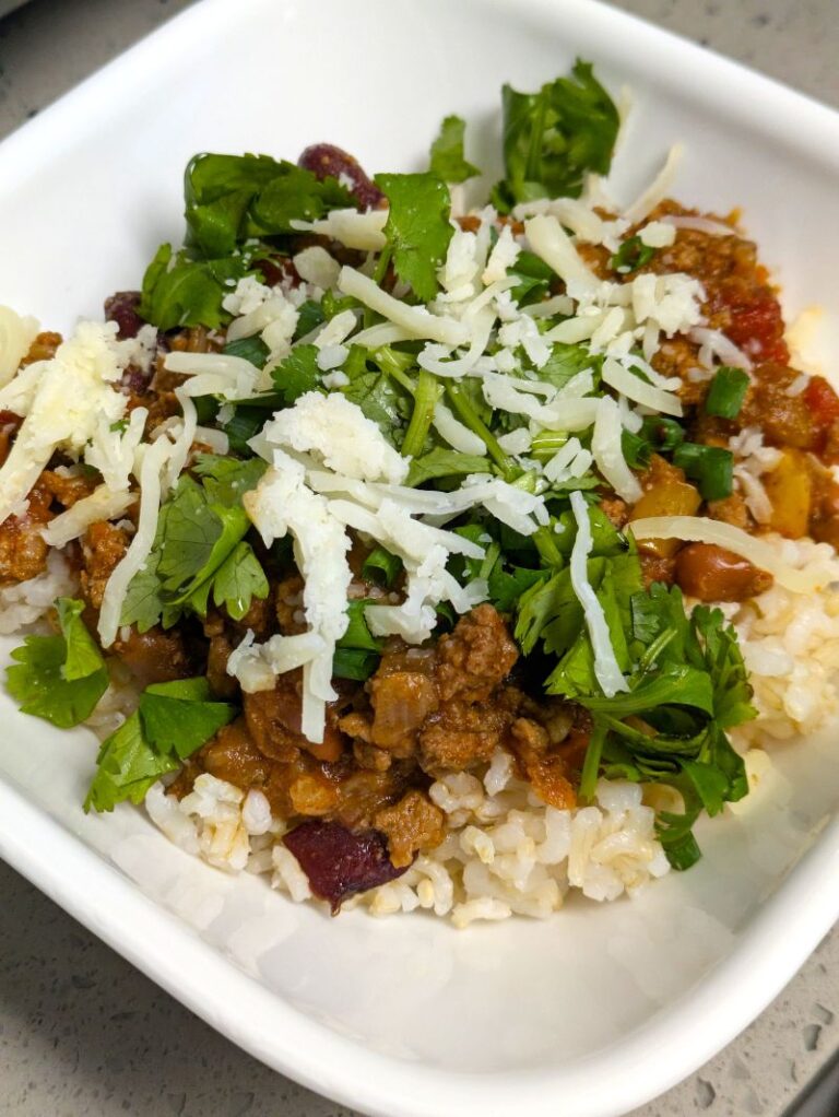 bowl of big batch mild turkey chili with toppings