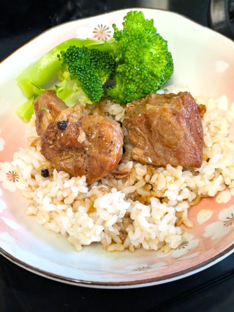 savory pork adobo on rice