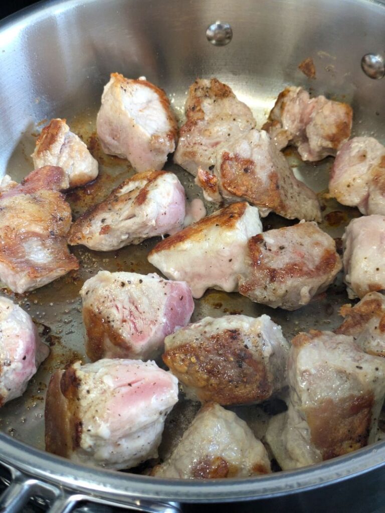 seared pork in pot for savory pork adobo
