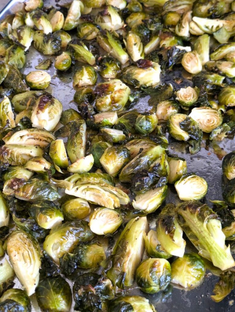 roasted brussel sprouts on a baking sheet pan