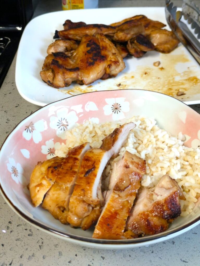 sliced teriyaki chicken on a plate